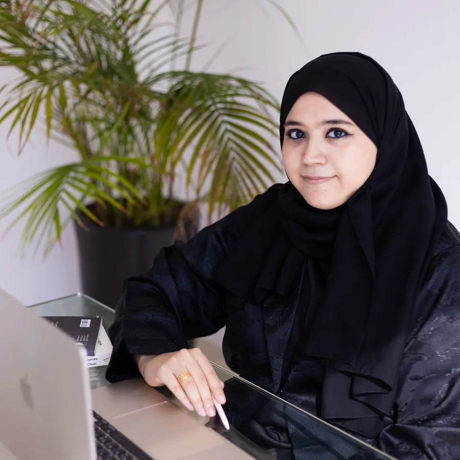 Bouchra Rebiai at her desk at Aurora Hikma, an Arabic content writing agency in Dubai