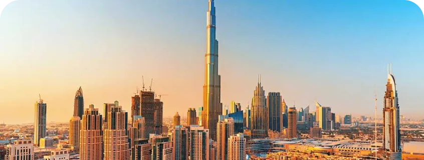A wide shot of the Dubai skyline featuring Burj Khalifa, the iconic tower in the city the translation company Aurora Hikma is headquartered in.