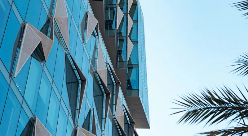 A modern Dubai corporate tower, from a UAE government website localization case study
